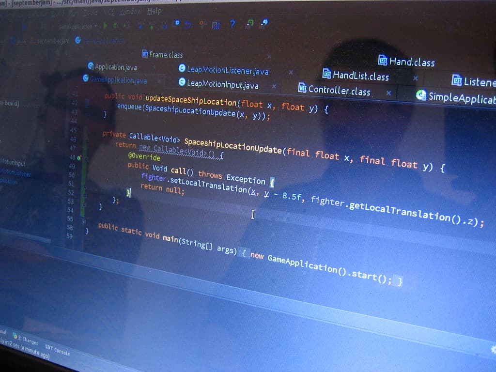 Developer's screen reflecting lines of code